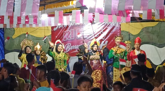 Keterangan Foto : Masyarakat ramai bergembira menyambut hari kemerdekaan Republik Indonesia di Kelurahan Loloan Barat. 

Sumber : Yus/Jpost